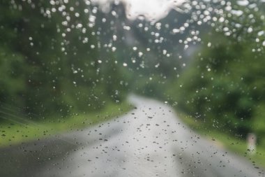 Raindrops on a car windshield clipart