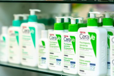 Berlin, Germany - September 30, 2018: CeraVe skincare products displayed on a pharmacy shelf. Selective focus clipart