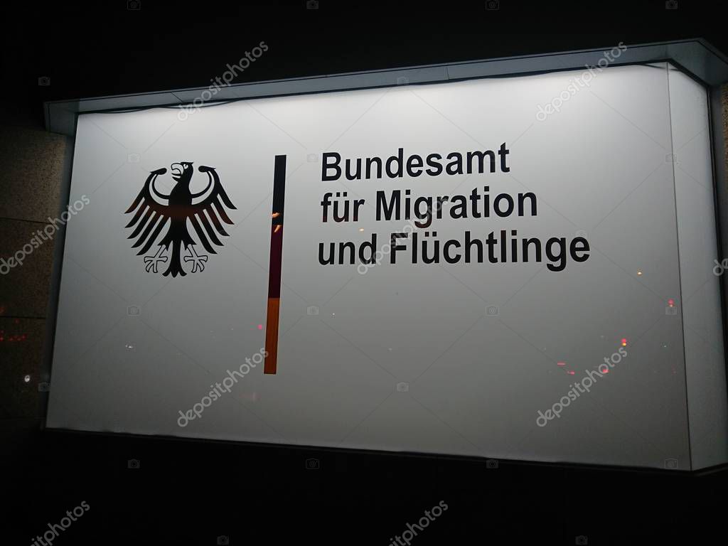 Berlin, Germany - October 13, 2018: Signage of the Bundesamt fr Migration und Flchtlinge (German for Federal Office for Migration and Refugees), a German federal agency