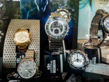 Rome, Italy - August 3, 2018: Festina watches displayed in a store window. Festina is now a Spanish watch brand. In 1984, businessman Miguel Rodrguez acquired Festina, a brand founded in Switzerland clipart