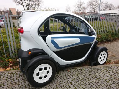 Berlin, Germany - November 26, 2018: Renault Twizy two-seat electric car designed and marketed by Renault clipart