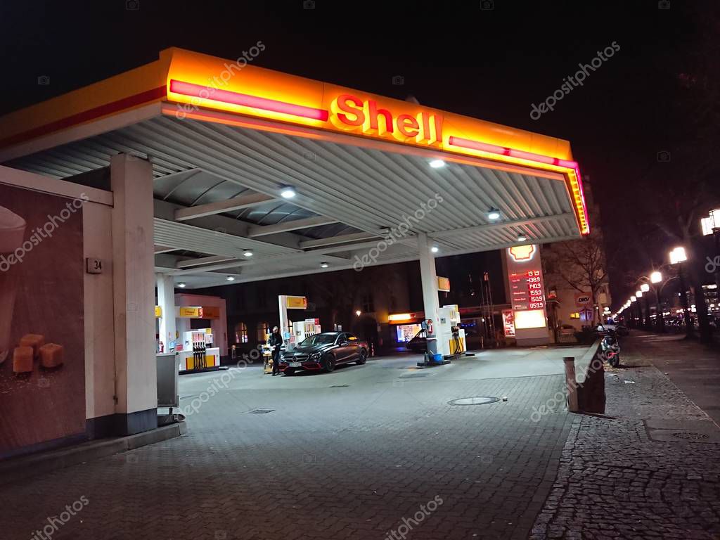 Berlin, Germany - December 19, 2018: Shell fuel station at night. Royal Dutch Shell plc, commonly known as Shell, is a BritishDutch multinational oil and gas company