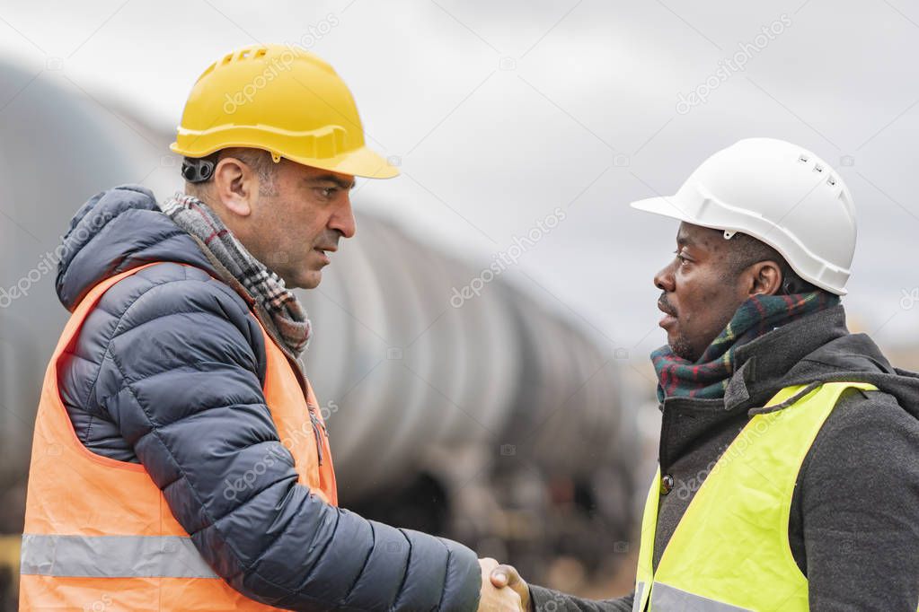 Successful handshake deal: reaching an agreement on construction site
