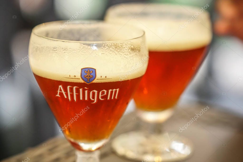 Berlin, Germany - September 4, 2018: Glass full of Affligem abbey rouge beer, made by the Heineken-owned Affligem Brewery