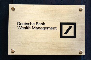 Verona, Italy - September 5, 2018: Metal plate of the Deutsche Bank Wealth Management clipart