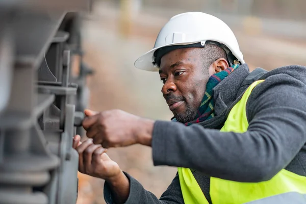 African American Mechanic Wearing Safety Equipment Helmet Jacket Checking Inspecting — Stock Photo, Image
