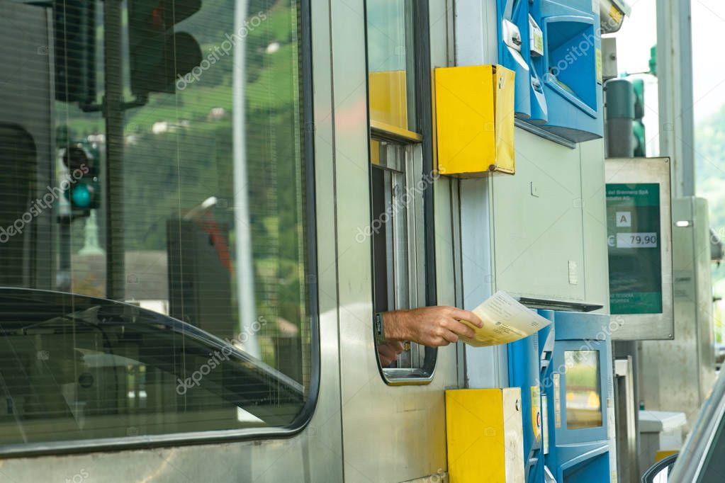 Graz, Austria - September 6, 2018: Toll collector working in the booth