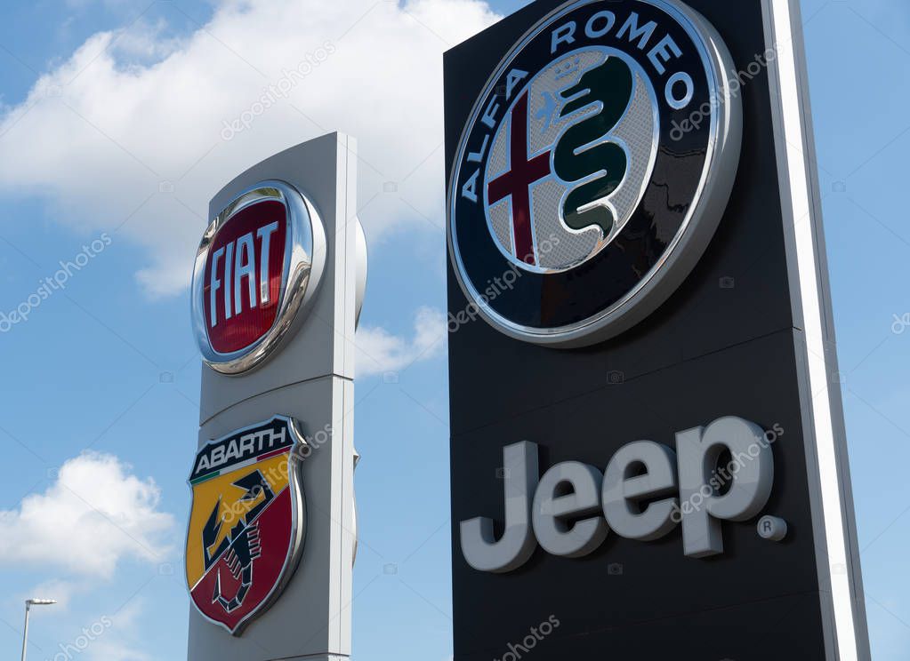 Verona, Italy - September 4, 2018: Signage of Fiat, Abarth, Alfa Romeo and Jeep car dealerships
