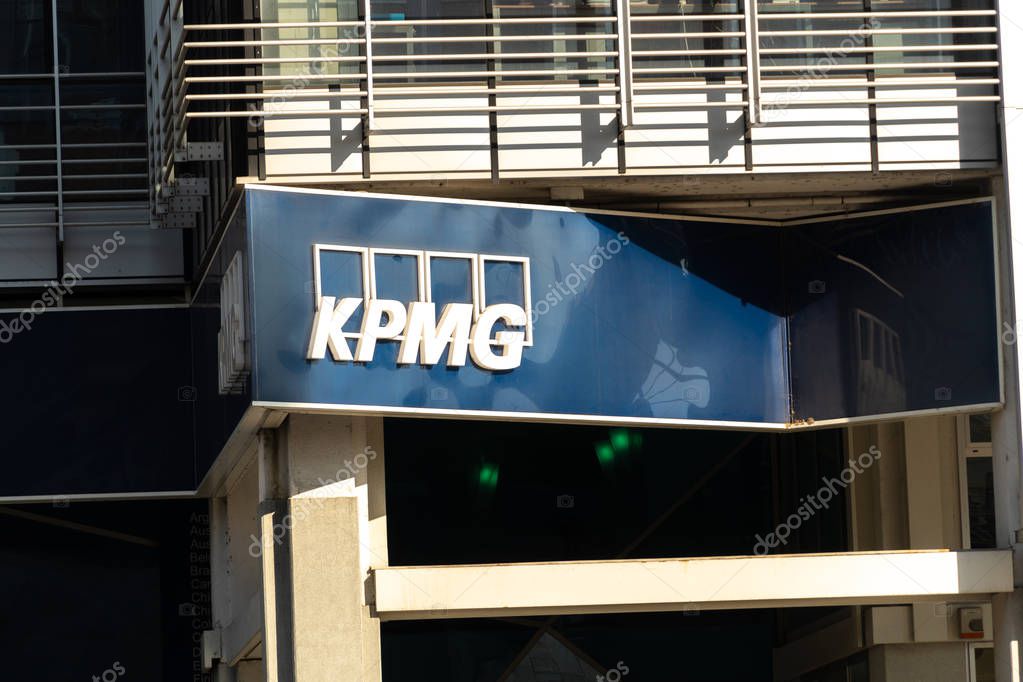 Rome, Italy - July 29, 2018: Signage of the Dutch company KPMG, professional service company and one of the Big Four auditors, along with Deloitte, Ernst & Young (EY), and PricewaterhouseCoopers (PwC)