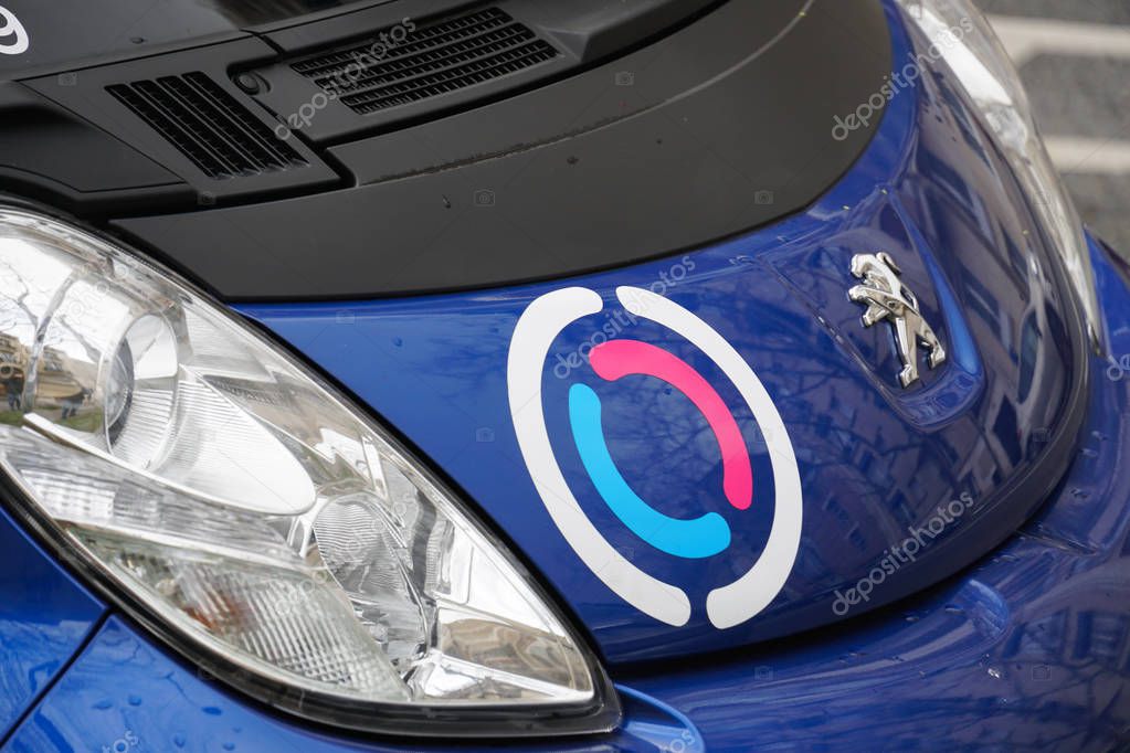 Paris, France - March 18, 2019: Free2Move Paris advertisement. Groupe PSA launched a carsharing service providing access to a fleet of 550 electric Peugeot i0n and Citron C-Zro vehicles