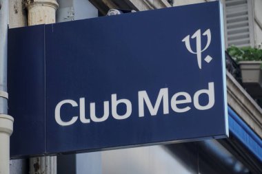 Paris, France - March 16, 2019: Signage of Club Med, previously known as Club Mditerrane SA, is a French private company specializing in all-inclusive holidays clipart