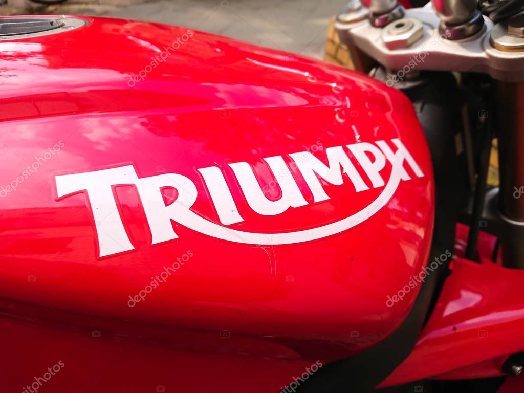 Berlin, Germany - April 23, 2019: Red Triumph motorcycle. Established in 1984, Triumph Motorcycles Ltd is the largest British motorcycle manufacturer