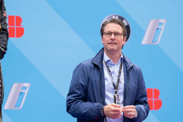 Berlin, Germany - May 25, 2019: Federal Minister of Transport and Digital Infrastructure Andreas Scheuer on the podium at the E-Prix ABB FIA Formula E race car Championship Award Ceremony