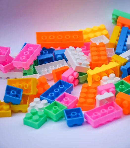 Multicoloured Plastic Construction Blocks Bricks Toy White Background — Stock Photo, Image