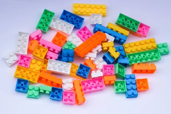 Multicoloured Plastic Construction Blocks Bricks Toy White Background — Stock Photo, Image