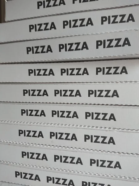 Stack of pizza boxes