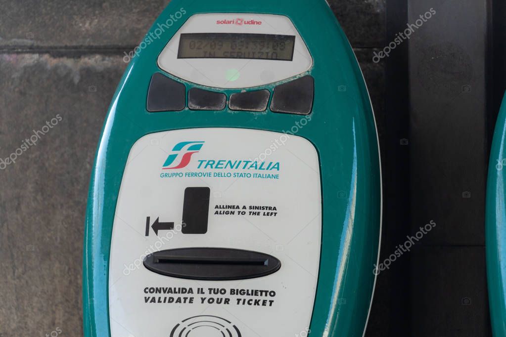 Rome, Italy - September 2, 2018: Trenitalia ticket validation machines. Primary train operator in Italy, Trenitalia is owned by Ferrovie dello Stato Italiane, itself owned by the Italian Government