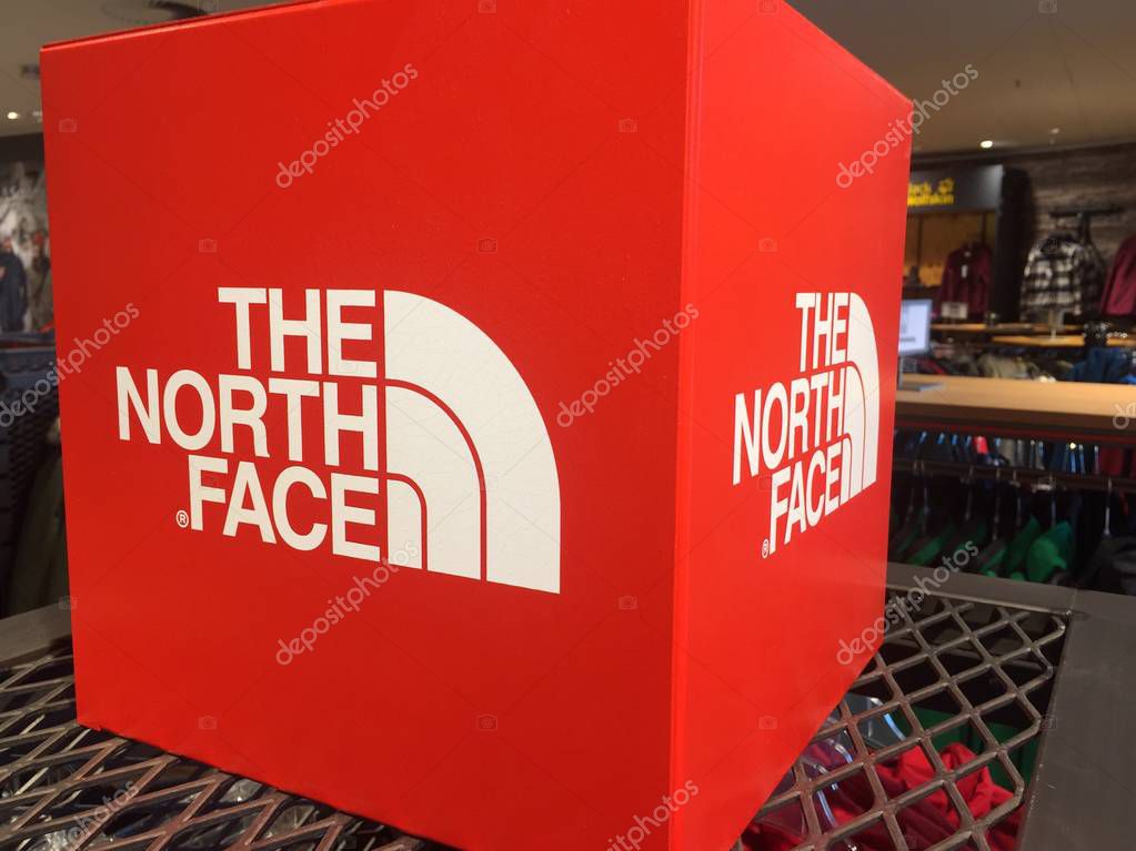 The North Face sign. The North Face, Inc. is an outdoor product company specializing in outerwear, fleece, shirts, footwear, and equipment