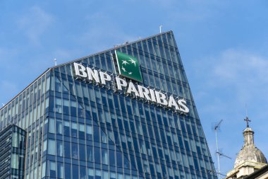 Milan, Italy - July 29, 2018: BNP Paribas bank signboard on the Diamond Tower (Italian Torre Diamante or colloquially Diamantone), a high-rise building in Milan business district clipart
