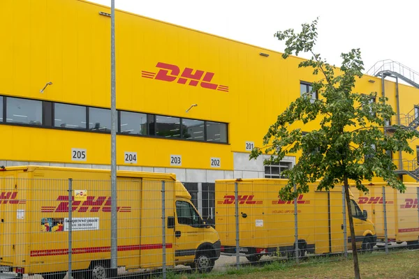Berlin, Germany - July 30, 2019: DHL delivery point. Dhl is global market leader in logistics industry. It commits its expertise in international parcel, express, air and ocean freight, road and rail
