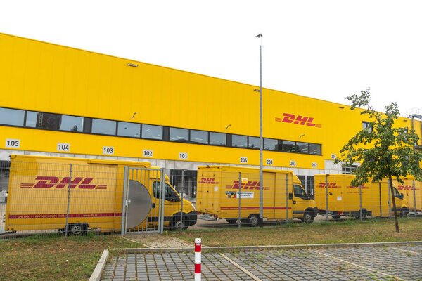 Berlin, Germany - July 30, 2019: DHL delivery point. Dhl is global market leader in logistics industry. It commits its expertise in international parcel, express, air and ocean freight, road and rail