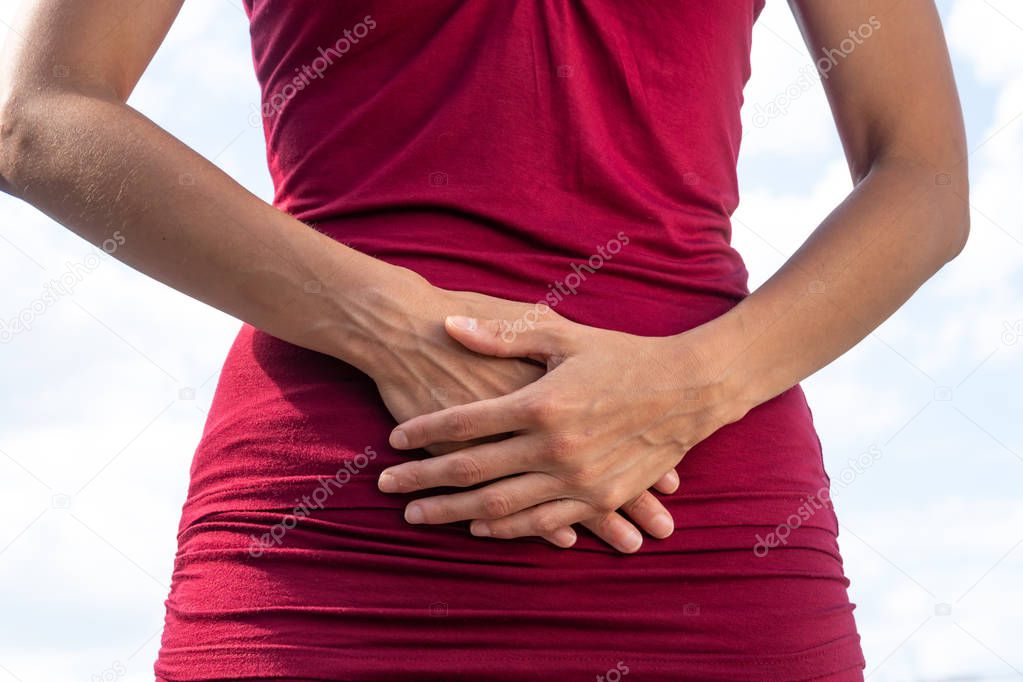 Stomach ache. Woman with menstrual or abdominal pain