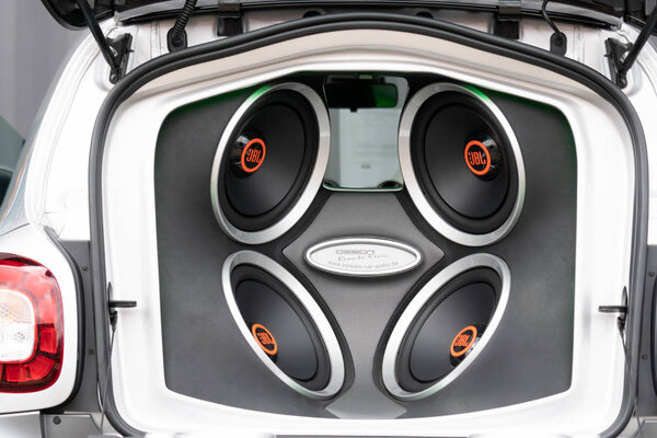 Berlin, Germany - May 25, 2019: JBL Electric amplifier in a vehicle