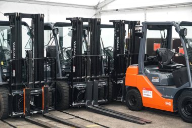 Berlin, Germany - May 24, 2019: Toyota Tonero 25 diesel forklift truck clipart