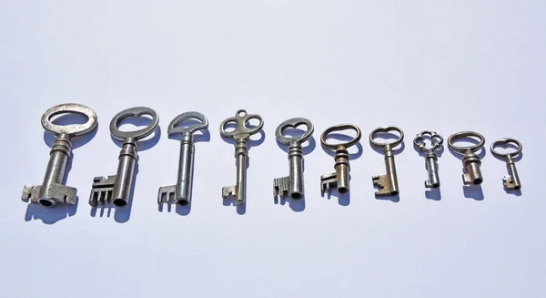 Ten Small Antique Pipe Keys White Background — Stock Photo, Image