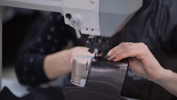 Male craftsman makes stylish footwear or repair — Stock Video
