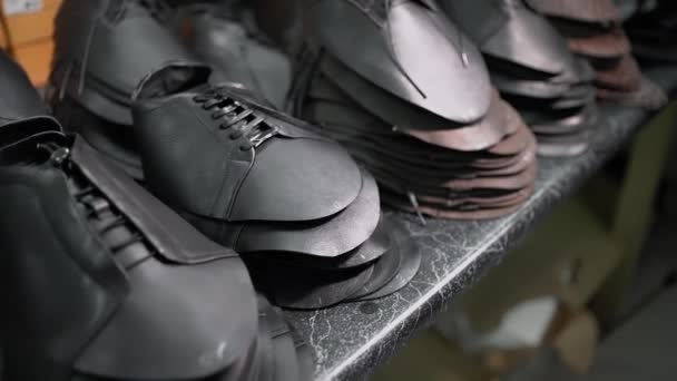 Manufacture with stylish modern casual footwear molds — Stock Video