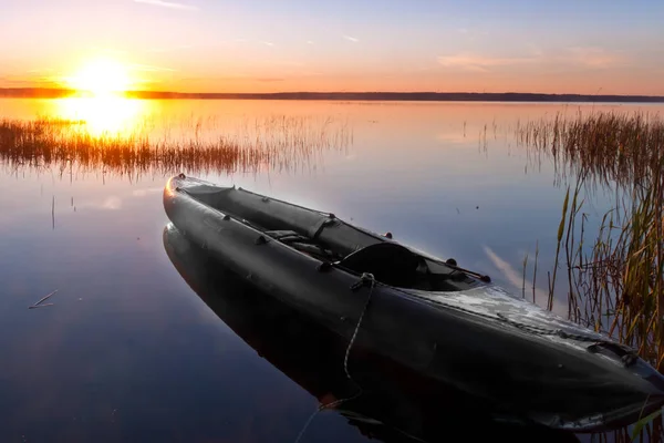 Kayak in the rays of the sun. Symbol: waiting for adventure. Russia. Pleshcheyevo lake