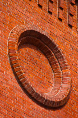 bir tuğla duvar, kırmızı daire