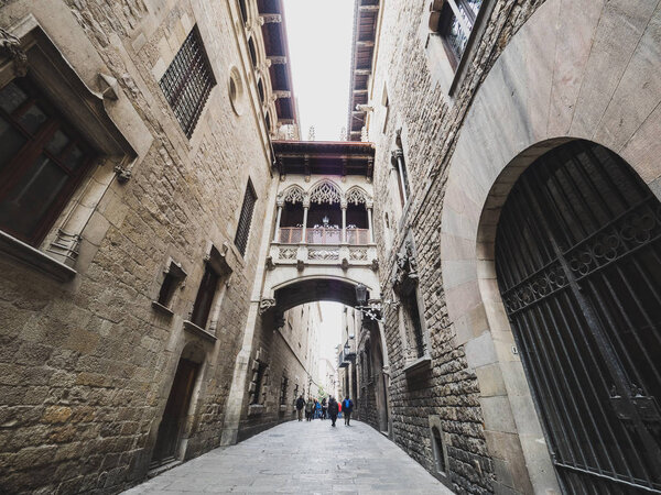 Barcelona, Spain - December 10, 2017. View of the Pont del Bisbe bridge crossing from the Generalitat's Palace to the Canon's House in Barcelona, Spain
