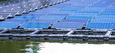Solar power station float on water,Ecological energy renewable solar panel plant electric power. clipart
