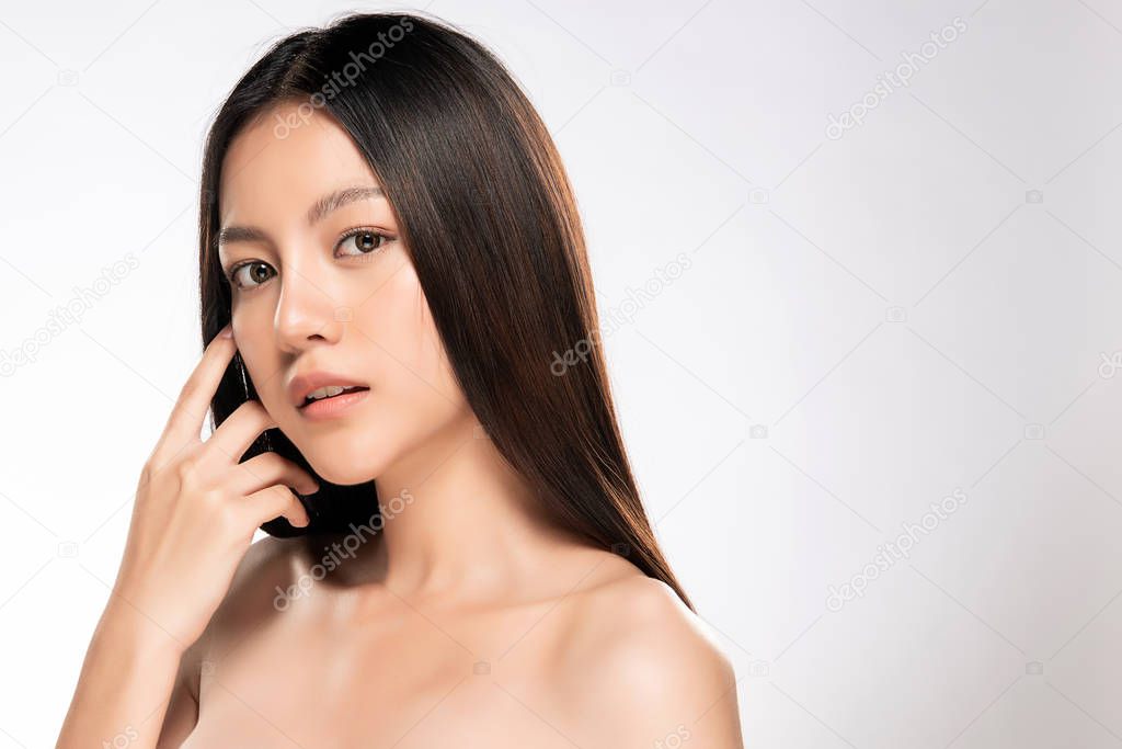 Beautiful Young asian Woman with Clean Fresh Skin look. Girl beauty face care. Facial treatment. Cosmetology, beauty and spa.