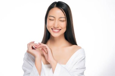 Temiz ciltli güzel Asyalı bir kadın.