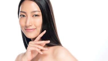 Temiz ciltli güzel Asyalı bir kadın.,