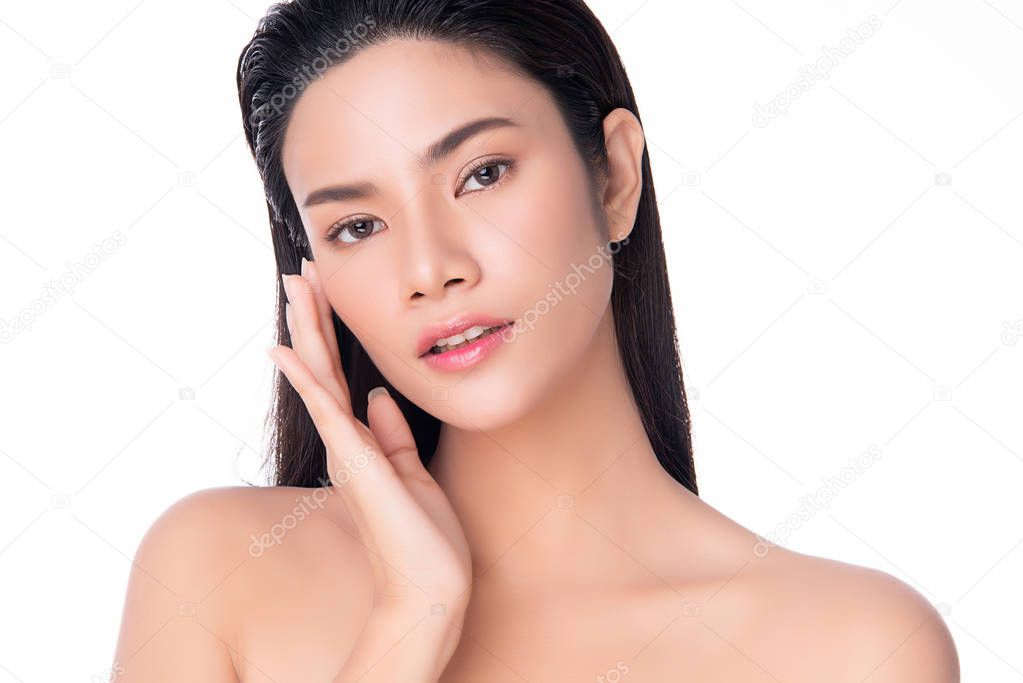 Beautiful Young Asian woman touching soft cheek smile with clean and fresh skin Happiness and cheerful, isolated on white background,Beauty and Cosmetics Concept,