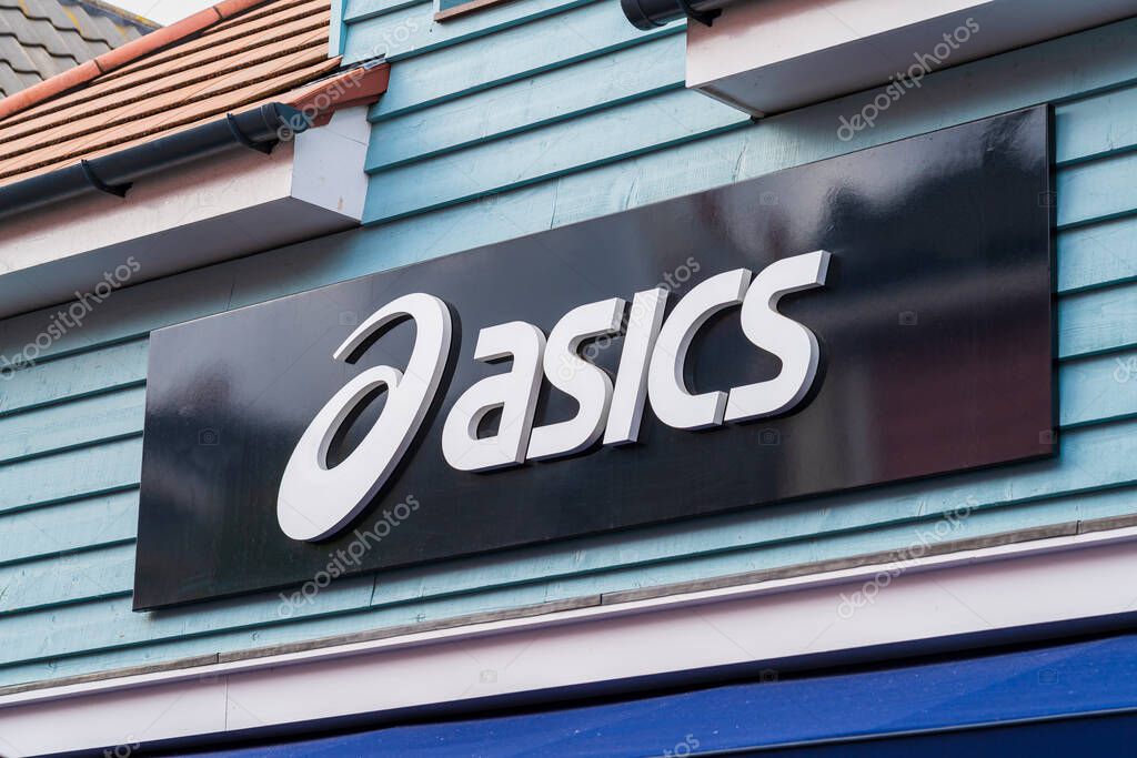 Cannock, Staffordshire, UK  September 9th 2025 Logo of Asics, a Japanese, multinational sportswear company at an outlet store