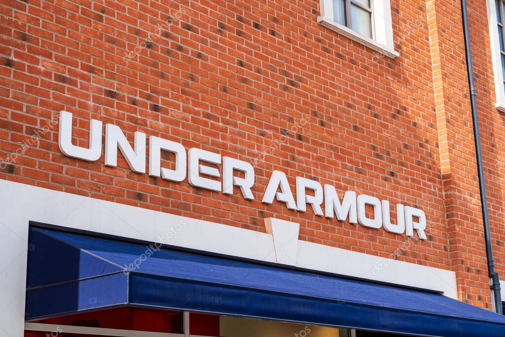 Cannock, Staffordshire, UK  September 9th 2025 Front logotype signage of Under Armour, a global clothing brand at an outlet store