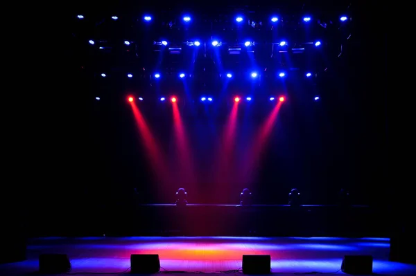 Free stage with lights, lighting devices. Background.