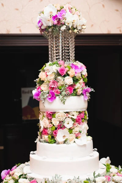 Wedding details - wedding cake dessert with flowers as decor