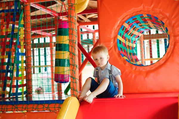 Indoor playground with colorful plastic balls for children.