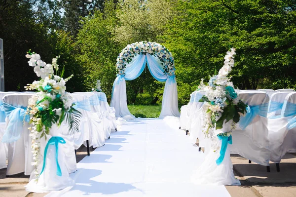 Wedding ceremony outdoors. Wedding ceremony decoration, beautiful wedding decor, flowers