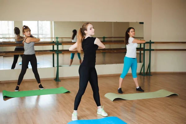Sports woman doing aerobics. The concept of diet and healthy food and lifestile.