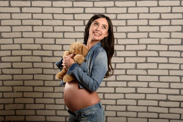 pregnancy, people and expectation concept - close up of happy pregnant woman with big belly