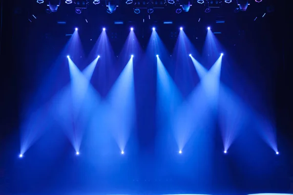 Free stage with lights, lighting devices. Night show.