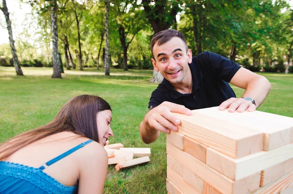 Group game of physical skill with big blocks