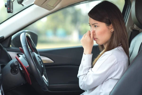 Young Woman Holding Her Nose Because Bad Smell Car Stock Image